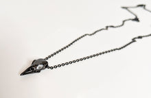 Raven skull pendant
